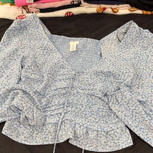 Long sleeve blue blouse with white flowers